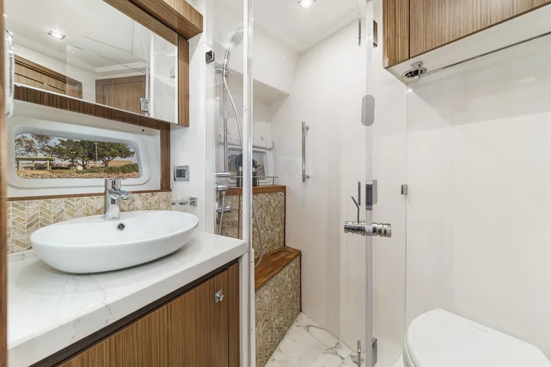 Slide: The Image of Luxurious bathroom interior of 2018 Sea Ray Fly 510 yacht with modern fixtures. - 43