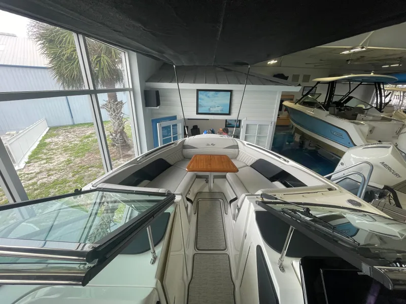 Slide: The Image of Interior view of 2026 Sea Ray SLX 280 Outboard with seating area. - 22