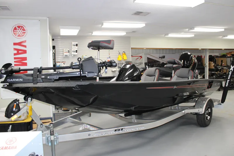 The Image of 2026 Xpress H18 boat with Garmin equipment on display in showroom. - 1