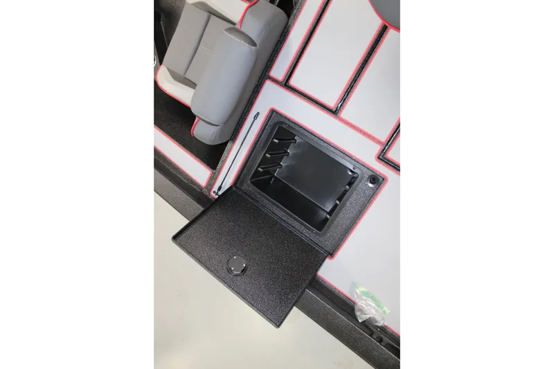 Slide: The Image of Interior of 2026 Xpress H18 boat with open storage compartment and seating. - 10