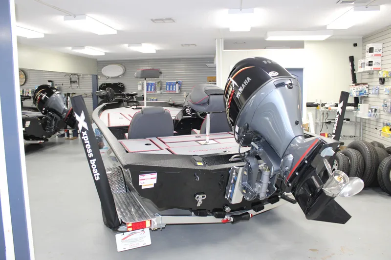 Slide: The Image of 2026 Xpress H18 boat with Yamaha engine in showroom. - 3