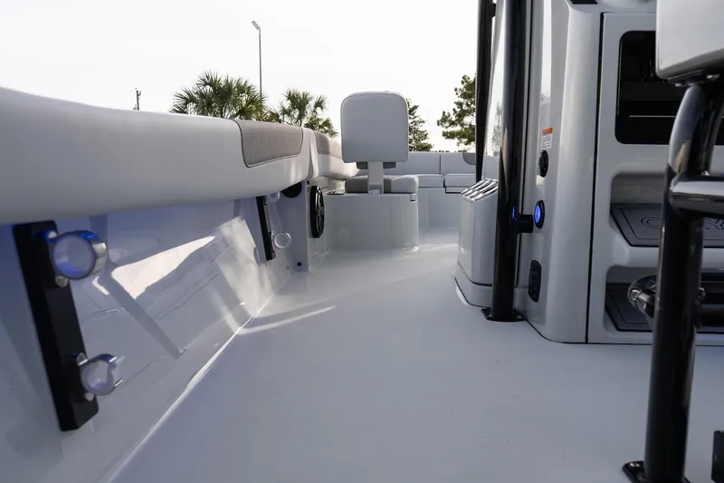 Slide: The Image of 2026 Caymas 28 HB boat interior with sleek seating and modern design elements. - 15