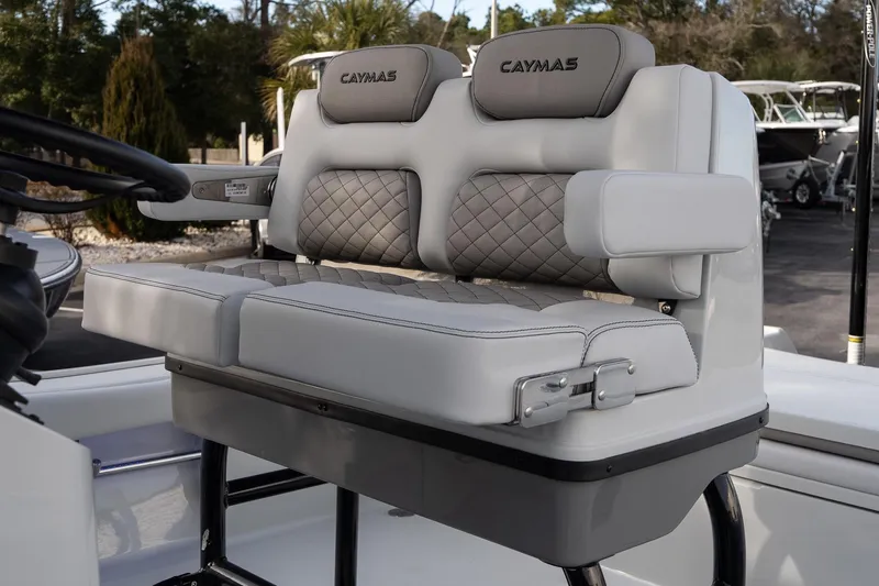 Slide: The Image of Luxurious seating on 2026 Caymas 28 HB boat with quilted upholstery and armrests. - 20
