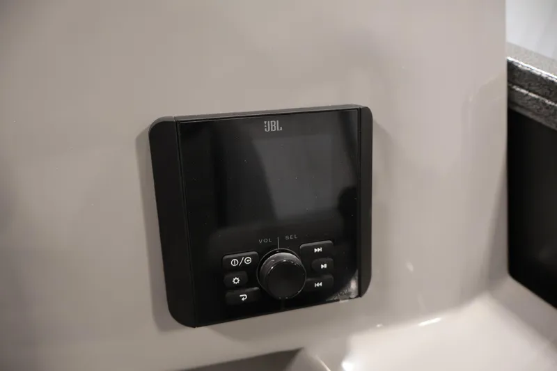 Slide: The Image of JBL audio control panel on 2026 Bentley Pontoons 223 Navigator Tri-toon. - 24