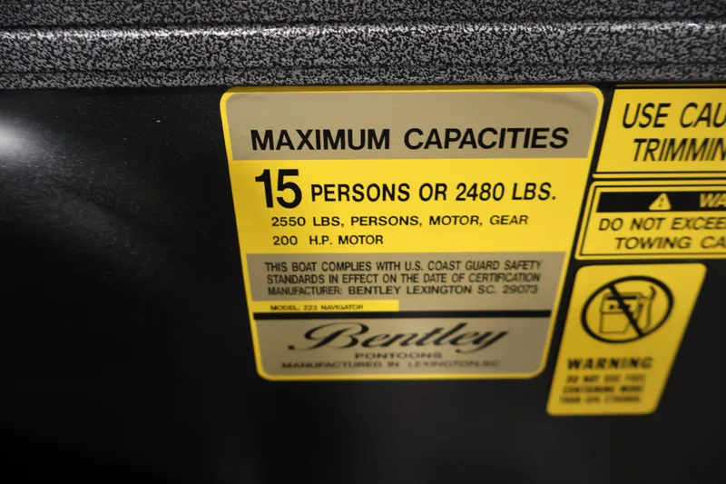 Slide: The Image of 2026 Bentley Pontoons 223 Navigator Tri-toon capacity label, 15 persons or 2480 lbs. - 28