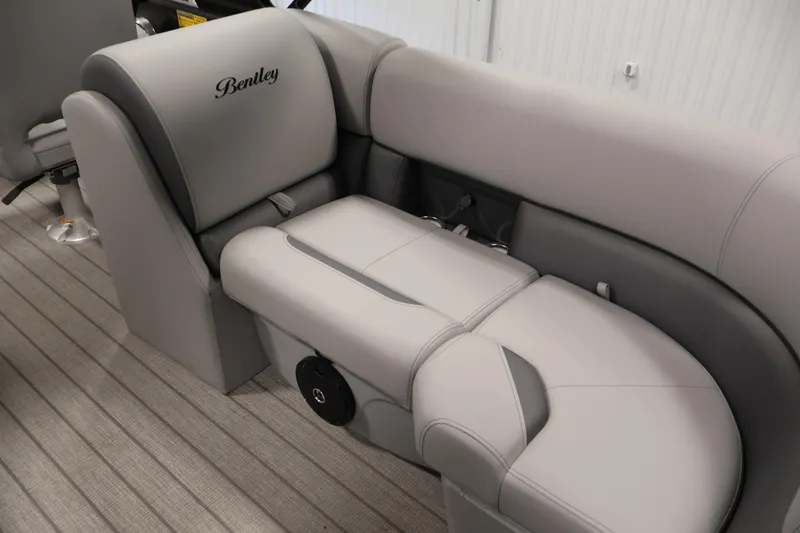 Slide: The Image of Luxurious seating in the 2026 Bentley Pontoons 223 Navigator Tri-toon boat, featuring elegant gray upholstery. - 35