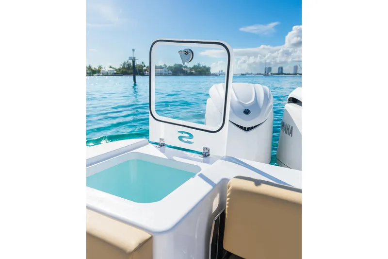 Slide: The Image of 2026 Sportsman Open 402 Center Console boat on clear blue water. - 5