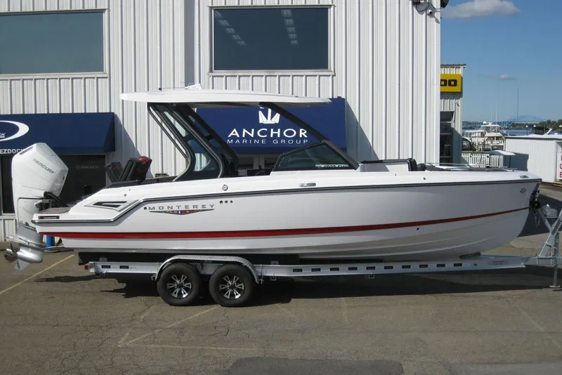 The Image of 2025 Monterey Elite 27 OB boat displayed at Anchor Marine Group showroom. - 0