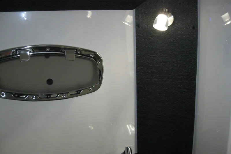 Slide: The Image of Interior view of 2025 Monterey Elite 27 OB boat, featuring a sleek hatch and modern design. - 23