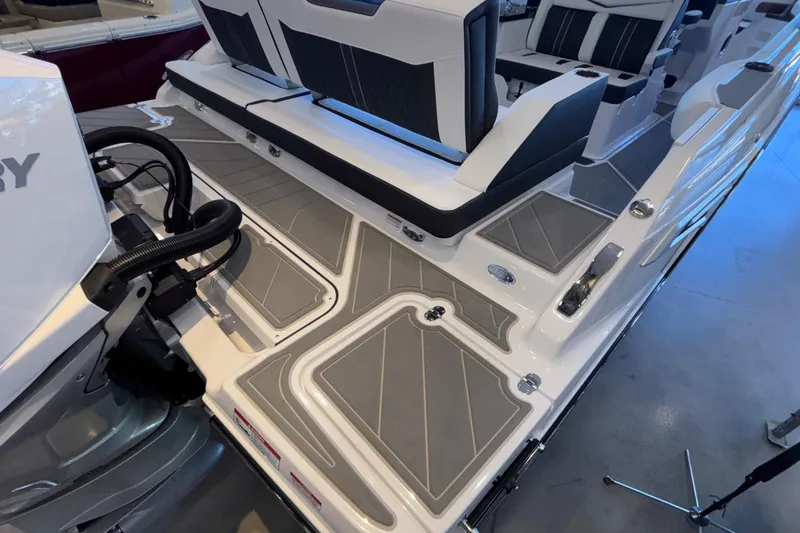 Slide: The Image of 2026 Monterey Elite 30 OB boat interior with sleek seating and modern design. - 10