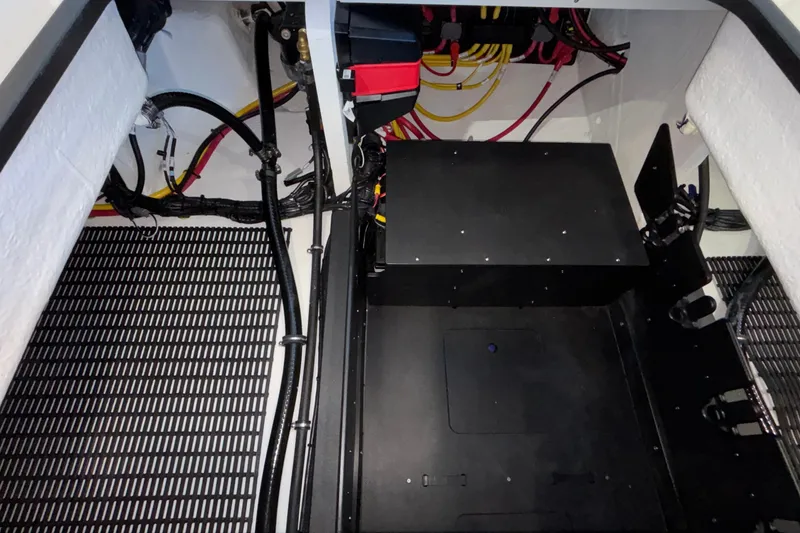 Slide: The Image of Engine compartment of 2026 Monterey Elite 30 OB, showcasing wiring and components. - 25