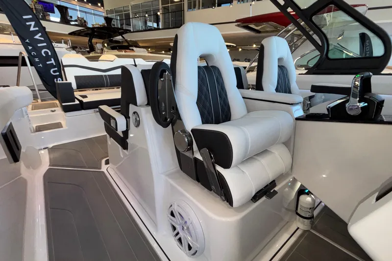Slide: The Image of Luxurious interior of 2026 Monterey Elite 30 OB yacht with plush seating and modern design. - 40