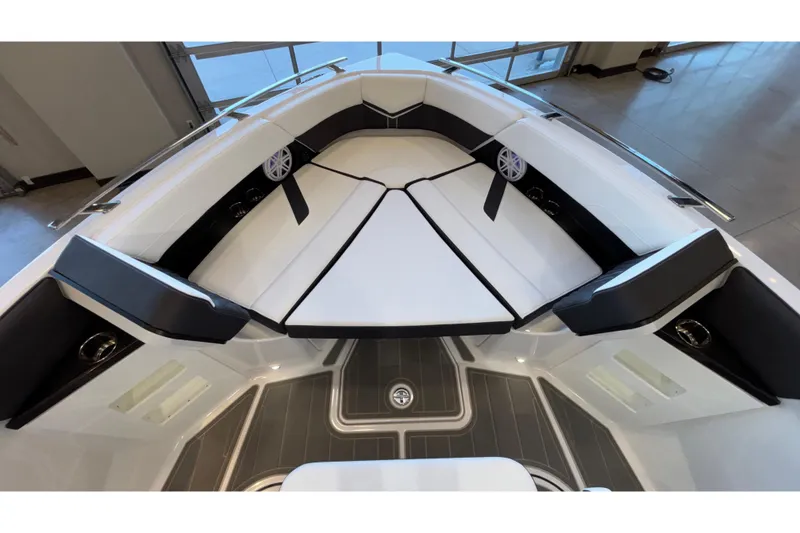 Slide: The Image of Luxurious interior of 2026 Monterey Elite 30 OB boat with sleek seating design. - 60