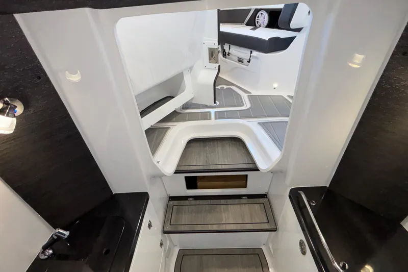 Slide: The Image of Interior view of 2026 Monterey Elite 30 OB boat, featuring sleek design and modern amenities. - 73