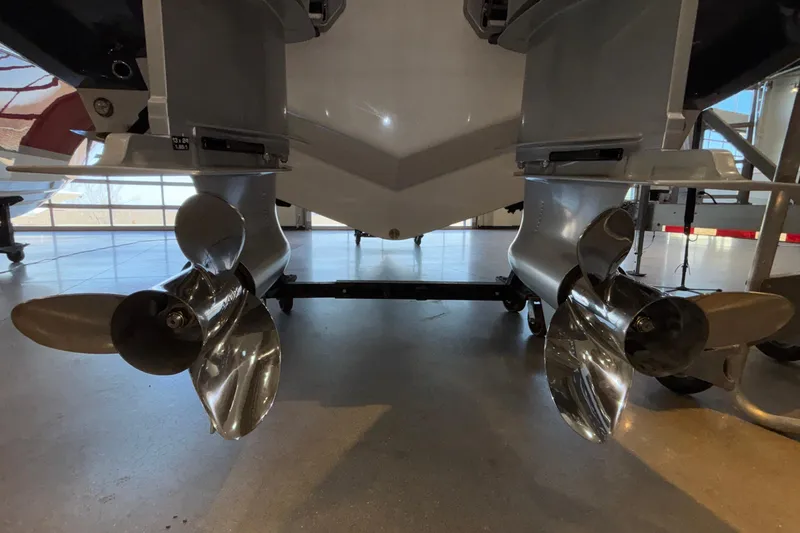 Slide: The Image of 2026 Monterey Elite 30 OB boat propellers in a showroom setting. - 8