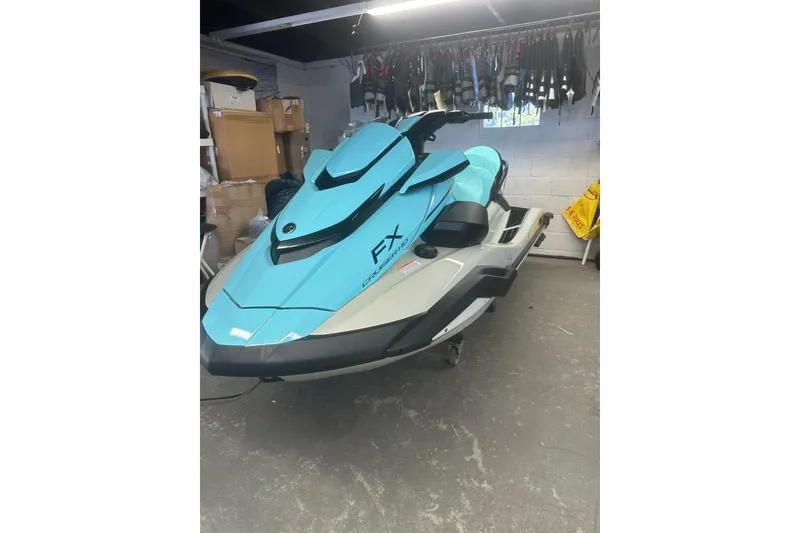 The Image of 2025 Yamaha WaveRunner FX Cruiser HO in a garage setting. - 1
