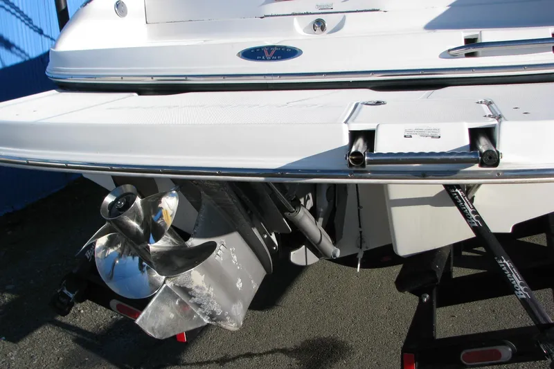 Slide: The Image of Rear view of 2004 Chaparral 260 SSi boat with propeller and swim platform. - 2