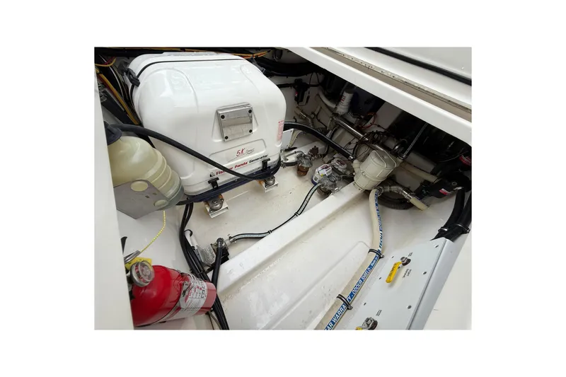 Slide: The Image of 2021 Fountain 43 NX boat cruising on open water, rear view. - 17