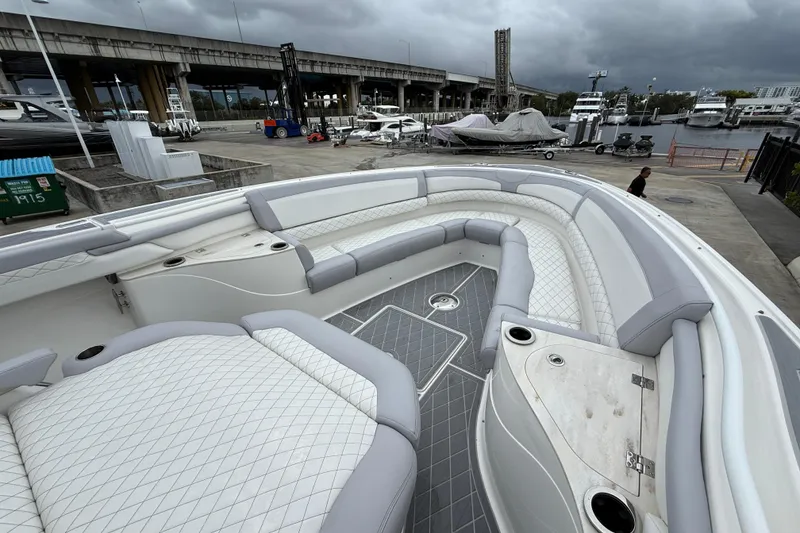 Slide: The Image of Luxurious seating area on 2021 Fountain 43 NX boat with waterfront view. - 25