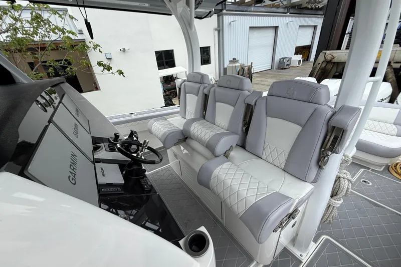 Slide: The Image of Luxurious 2021 Fountain 43 NX boat interior with spacious seating and elegant design. - 30