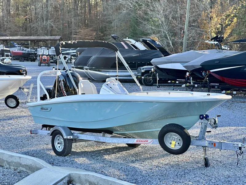 Slide: The Image of 2025 Boston Whaler 160 Super Sport on trailer outdoors. - 6
