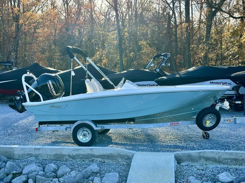 Slide: The Image of 2025 Boston Whaler 160 Super Sport on trailer outdoors. - 7
