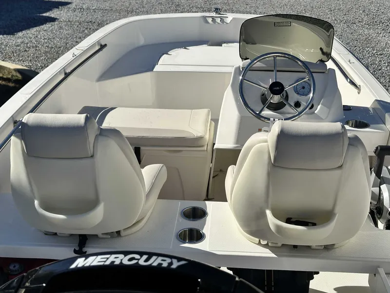 Slide: The Image of Interior view of the 2025 Boston Whaler 160 Super Sport boat. - 11