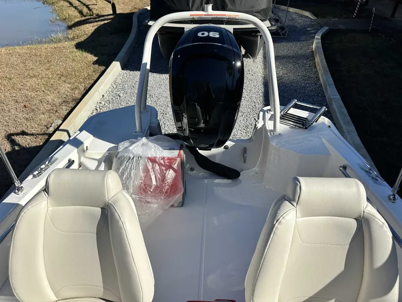 Slide: The Image of Interior of 2025 Boston Whaler 160 Super Sport with engine. - 12