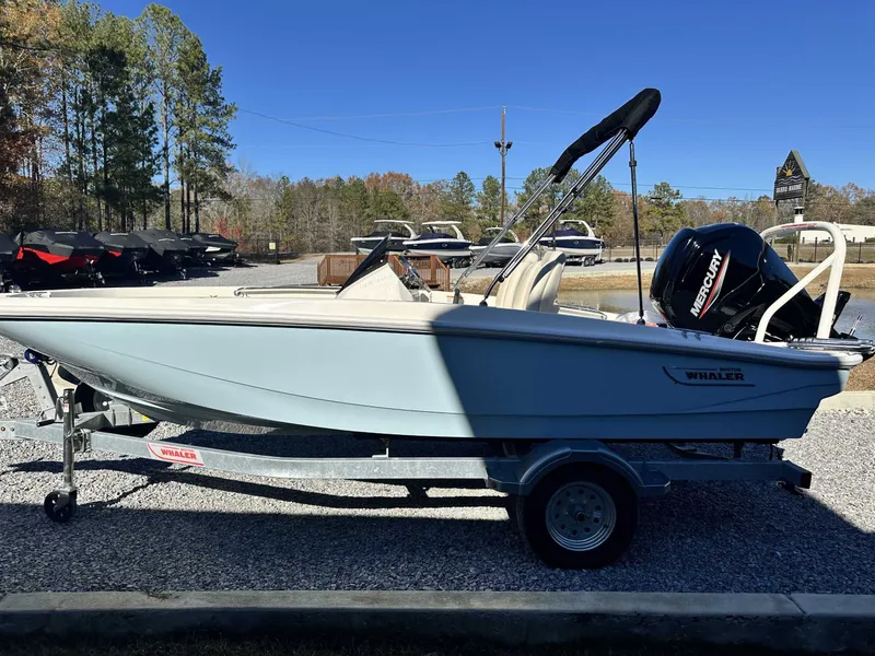 Slide: The Image of 2025 Boston Whaler 160 Super Sport boat on trailer. - 4