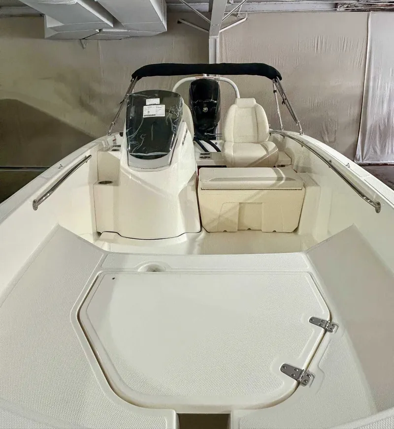 Slide: The Image of Interior view of 2025 Boston Whaler 160 Super Sport boat. - 7