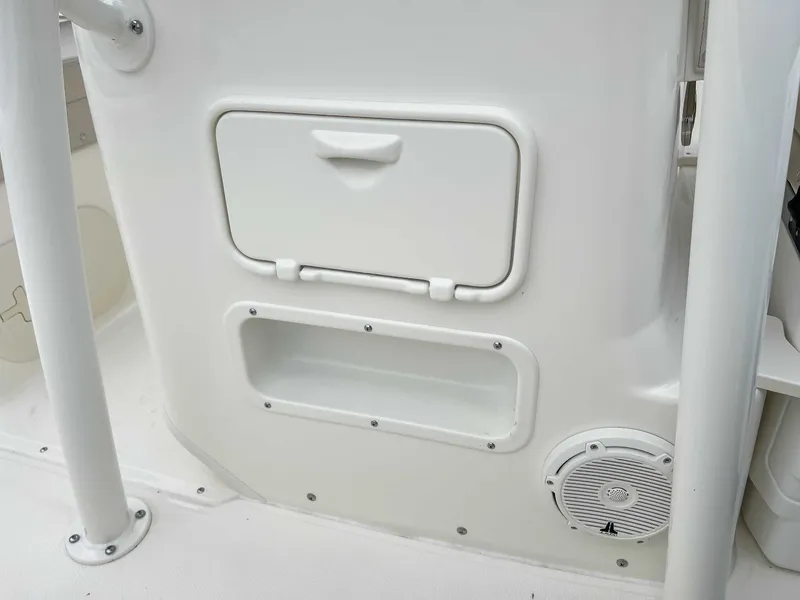 Slide: The Image of Interior of 2025 Boston Whaler 190 Montauk with storage and speaker. - 23