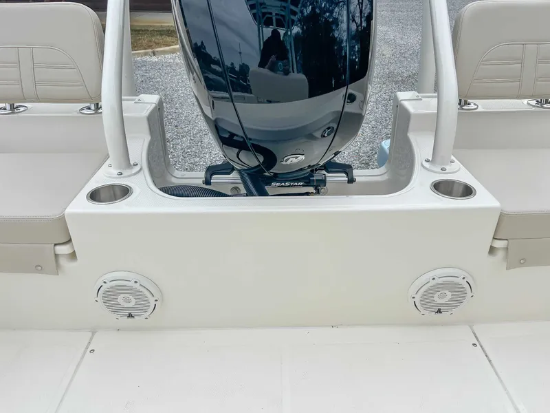 Slide: The Image of Boston Whaler 190 Montauk 2025 boat rear with motor and speakers. - 24