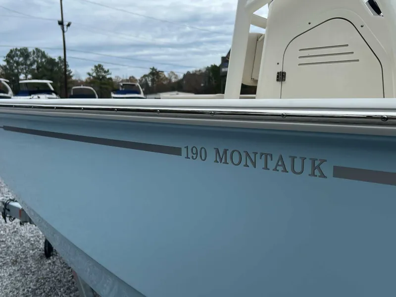 Slide: The Image of 2025 Boston Whaler 190 Montauk boat, side view. - 3