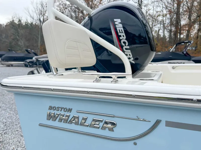 Slide: The Image of 2025 Boston Whaler 190 Montauk with Mercury engine outdoors. - 5