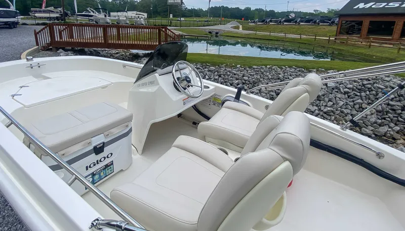 Slide: The Image of Interior view of the 2025 Boston Whaler 130 Super Sport boat. - 8