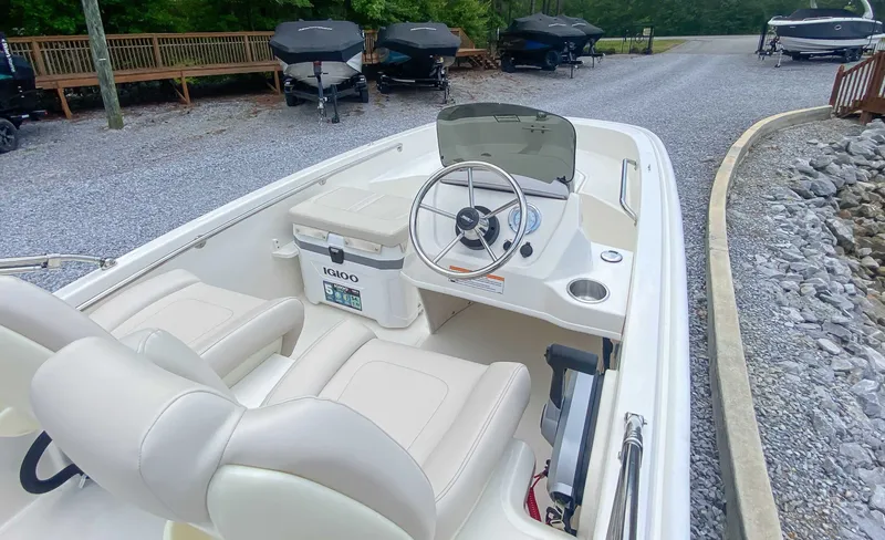 Slide: The Image of Interior view of 2025 Boston Whaler 130 Super Sport boat. - 9