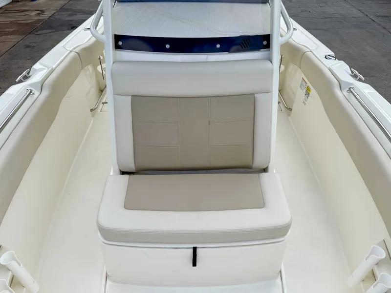 Slide: The Image of 2025 Boston Whaler 230 Outrage boat seating area. - 11