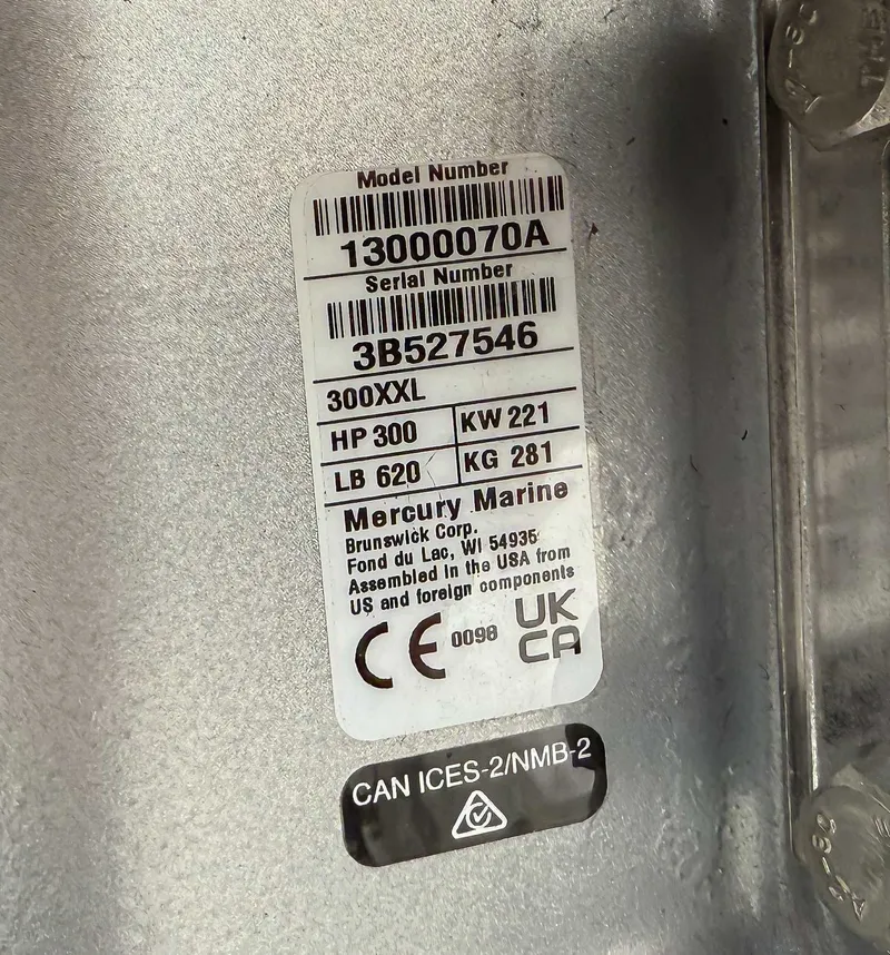 Slide: The Image of Label on a Mercury Marine engine, model 300XXL, 300 HP. - 13