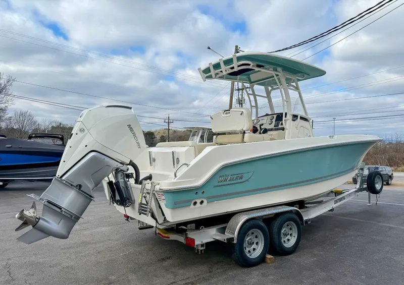 Slide: The Image of 2025 Boston Whaler 230 Outrage on trailer, exterior view. - 6