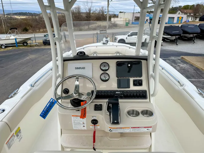 Slide: The Image of Interior view of 2025 Boston Whaler 230 Outrage boat. - 9