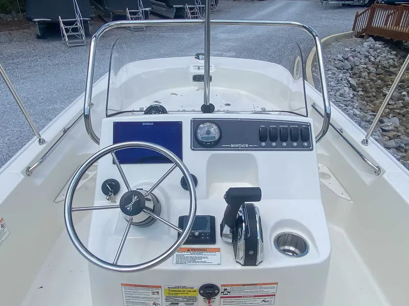 Slide: The Image of Boston Whaler 170 Montauk 2025 helm console. - 10
