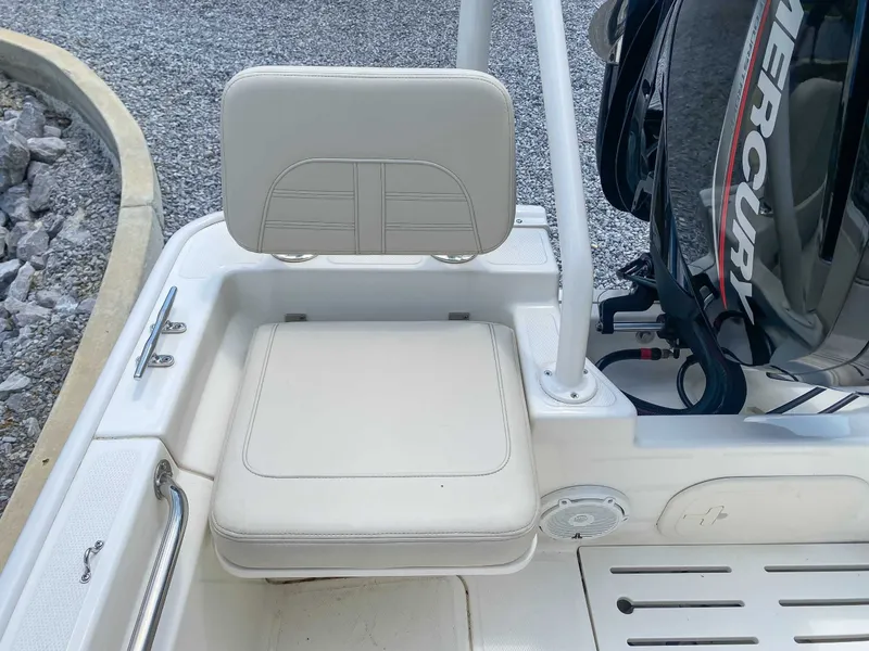 Slide: The Image of Boston Whaler 170 Montauk 2025 boat seat and engine view. - 13