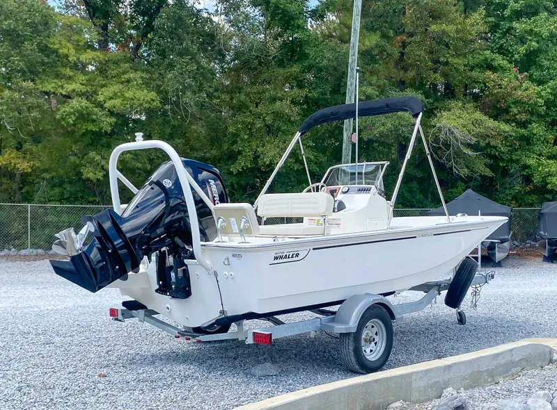 Slide: The Image of 2025 Boston Whaler 170 Montauk parked on trailer outdoors. - 7