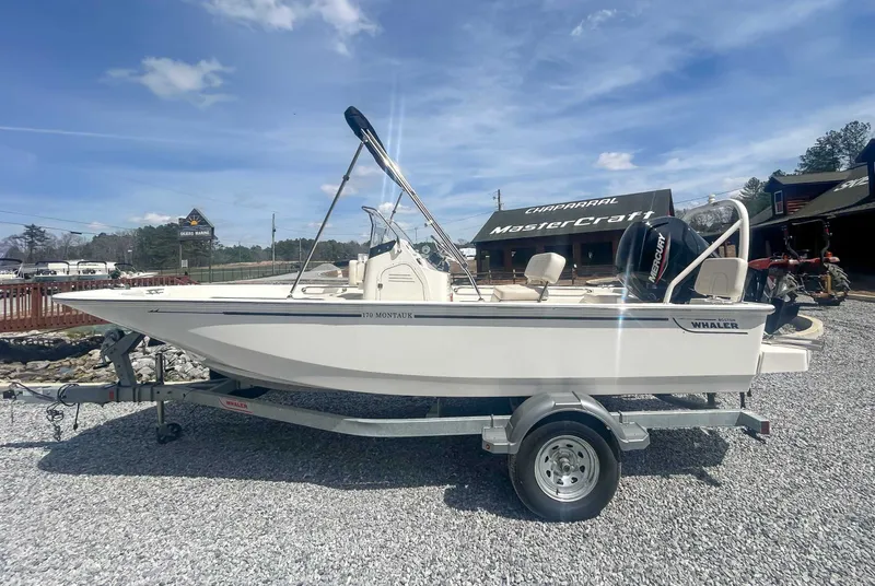 The Image of 2025 Boston Whaler 170 Montauk on trailer outdoors. - 1