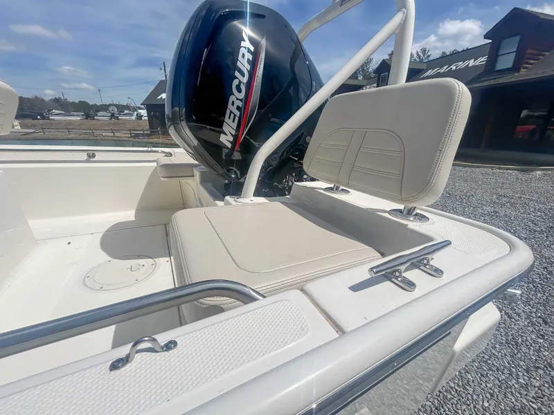 Slide: The Image of Boston Whaler 170 Montauk 2025 with Mercury engine, close-up of seating area. - 13