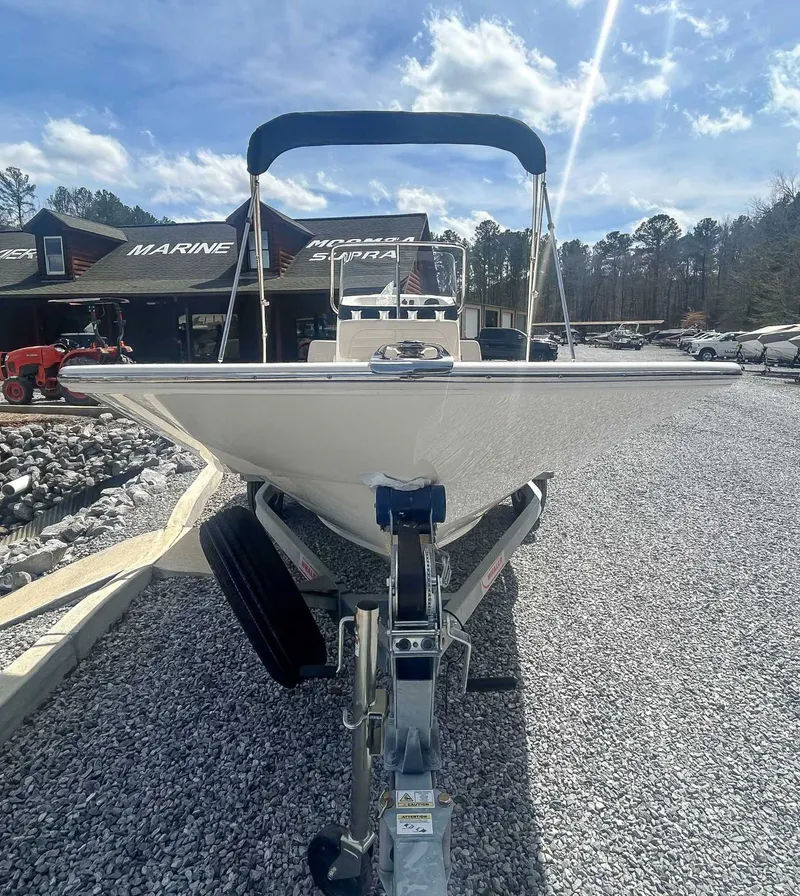 Slide: The Image of Boston Whaler 170 Montauk 2025 on trailer, sunny day. - 4