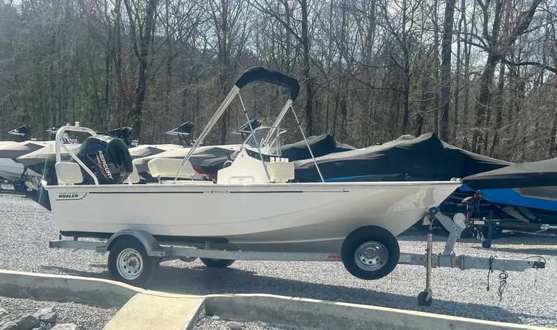 Slide: The Image of 2025 Boston Whaler 170 Montauk on trailer outdoors. - 5