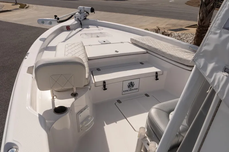 Slide: The Image of 2020 Blue Wave 2600 PureBay boat interior with seating and storage compartments. - 15