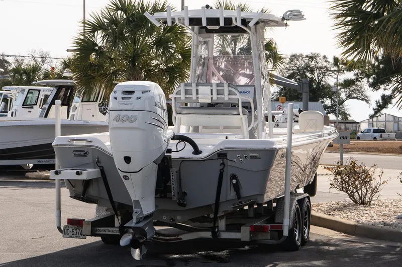 Slide: The Image of 2020 Blue Wave 2600 PureBay boat with powerful 400 horsepower engine on trailer. - 6