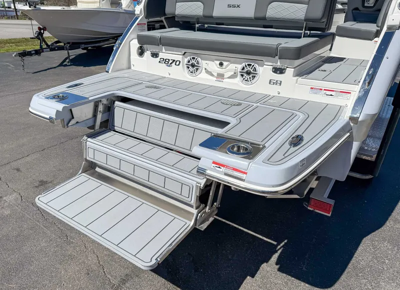 Slide: The Image of Rear view of 2025 Chaparral 2870 SSX with fold-out swim platform. - 10